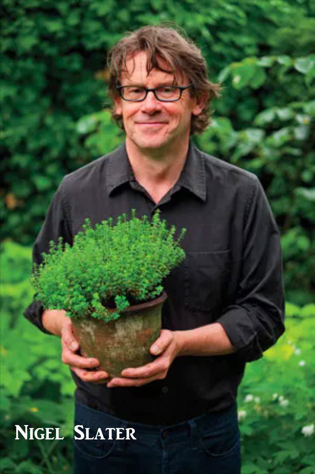 Nigel Slater holding a pot of plant